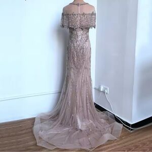 Nude sleeveless dress, size 10/12 US. Worn once.